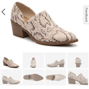 Woman’s size 7 faux snake booties